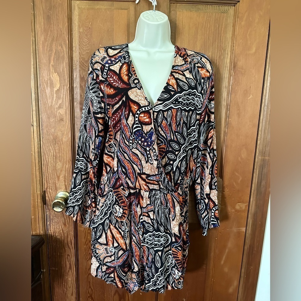 H&M Wild Pattern long sleeved Romper with Pockets Size 8